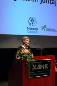 Speaker in front of audience